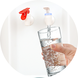 Filling glass of water from bottleless water cooler